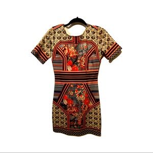 Fun dress with patterns and flowers good condition